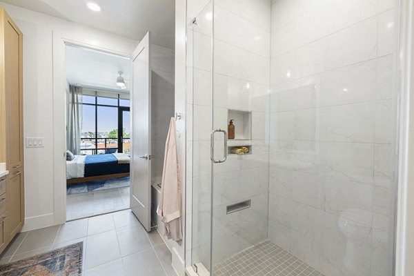 Bathroom featuring modern fixtures and sleek design at The Westcott Apartments