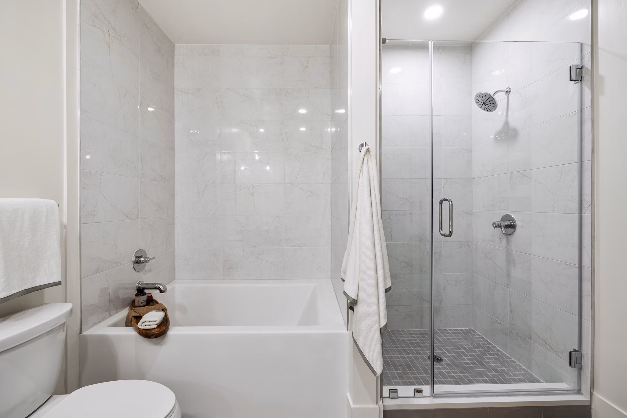 Bathroom featuring modern fixtures and sleek design at The Westcott Apartments