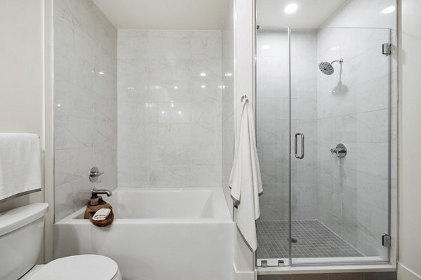 Bathroom featuring modern fixtures and sleek design at The Westcott Apartments