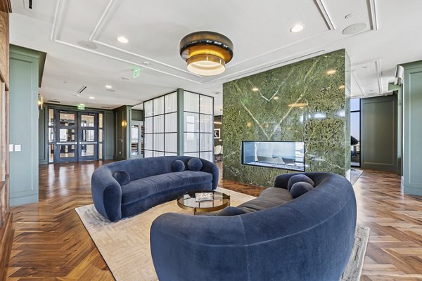 The Westcott Clubhouse: Elegant social space with cozy seating and modern decor at luxury Greystar apartments