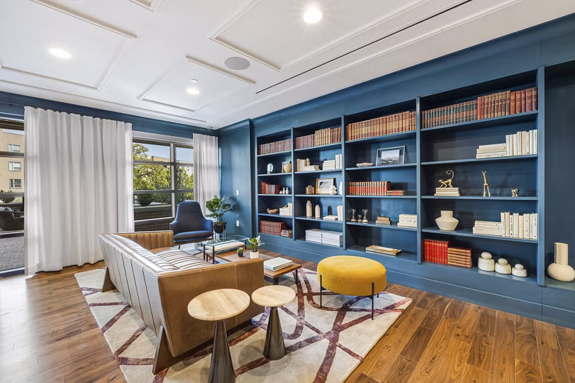 Elegant clubhouse featuring lounge seating and modern decor at The Westcott Apartments