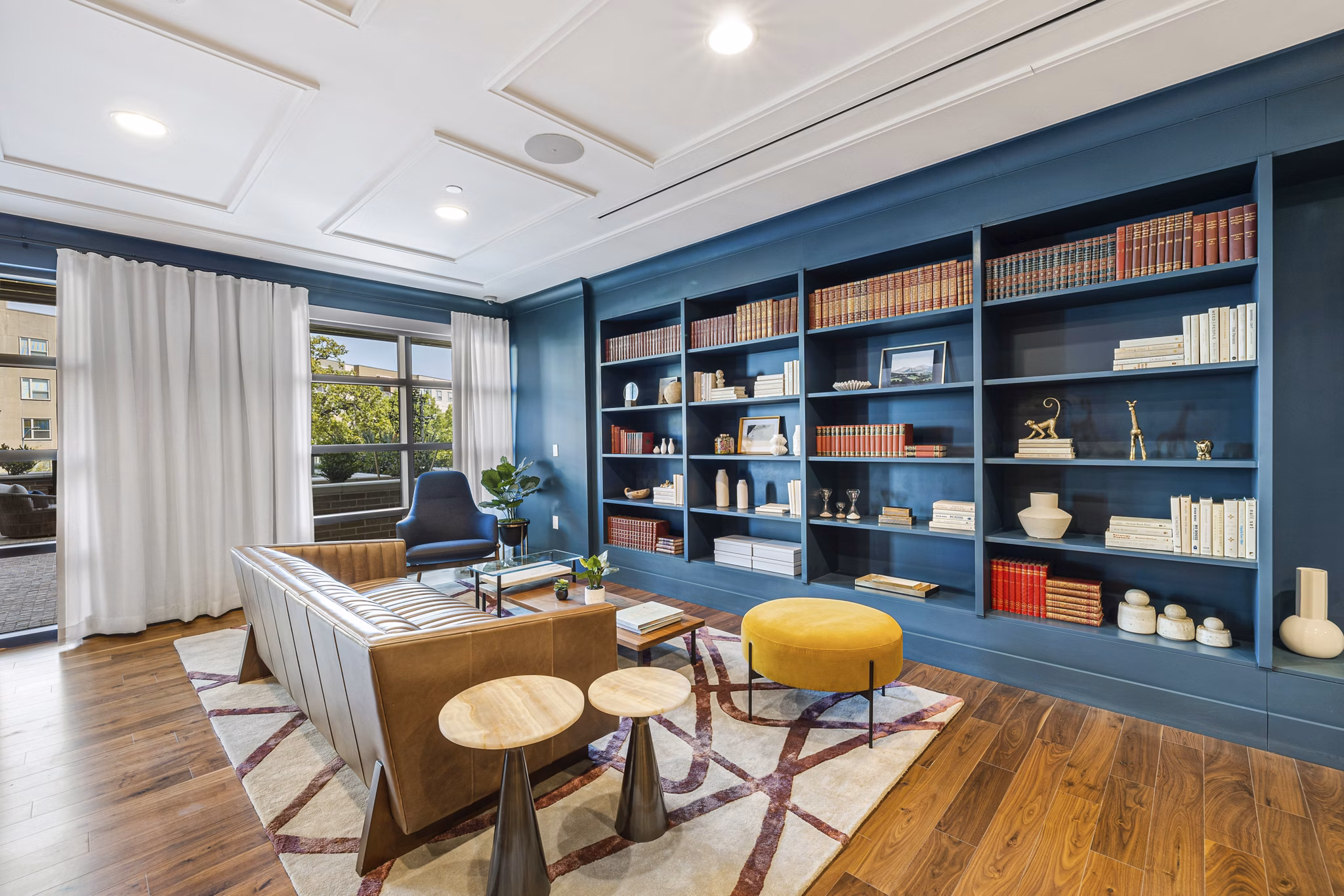 Elegant clubhouse featuring lounge seating and modern decor at The Westcott Apartments