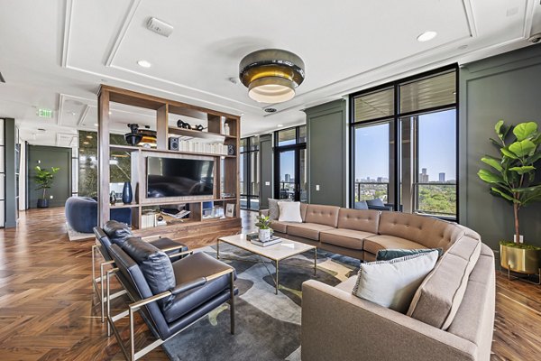 Modern clubhouse with communal seating and decor at The Westcott Apartments, luxury living in the heart of the community