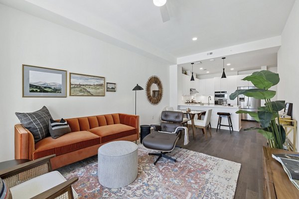 Spacious living room with modern decor at The Westcott Apartments, luxury rentals near popular urban amenities, ideal for contemporary living