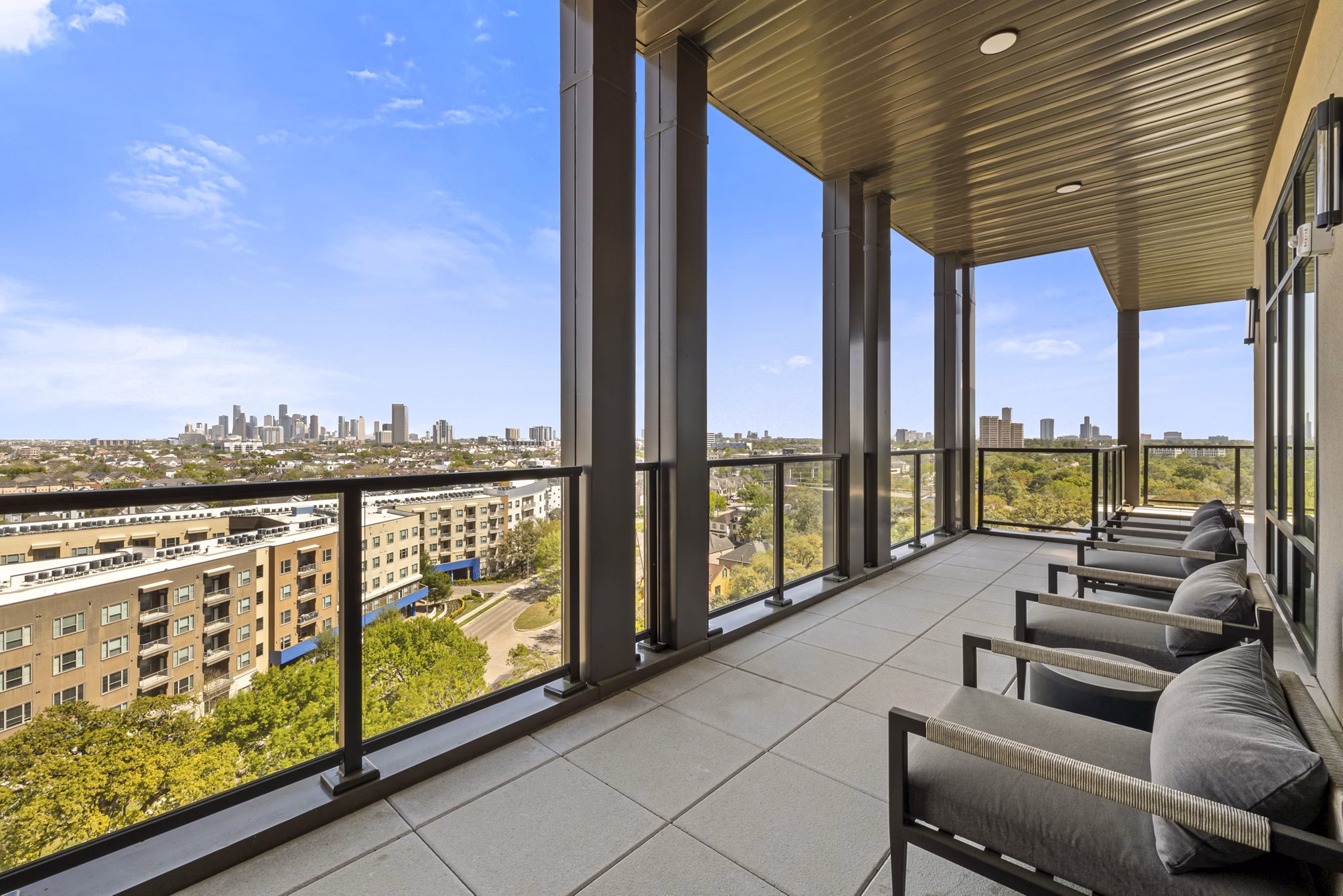 Spacious patio with modern seating at The Westcott Apartments, luxury living in a serene environment