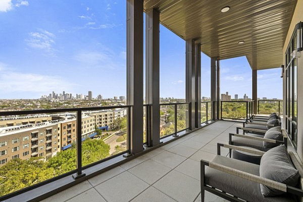 Spacious patio with modern seating at The Westcott Apartments, luxury living in a serene environment