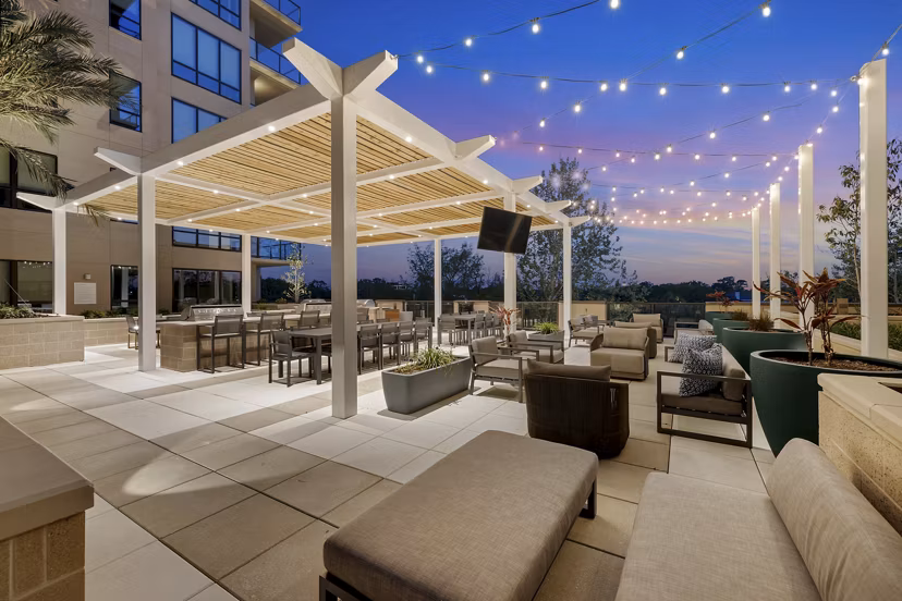Courtyard featuring lush greenery and seating areas at The Westcott Apartments, luxury living in an urban oasis