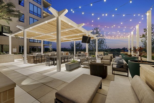 Courtyard featuring lush greenery and seating areas at The Westcott Apartments, luxury living in an urban oasis