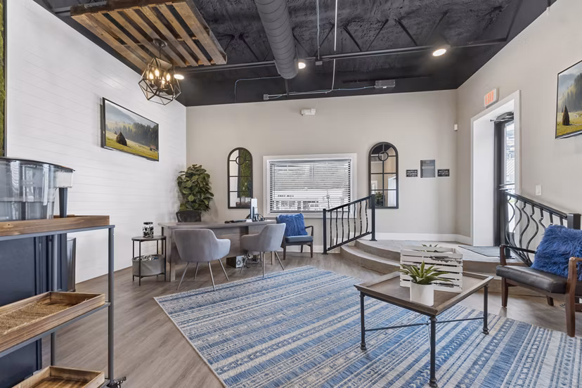 Clubhouse featuring stylish lounge area and modern decor at Treehouse Apartments in the Greystar luxury apartment community