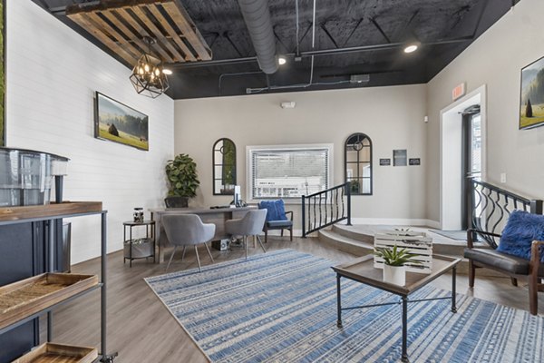 Clubhouse featuring stylish lounge area and modern decor at Treehouse Apartments in the Greystar luxury apartment community