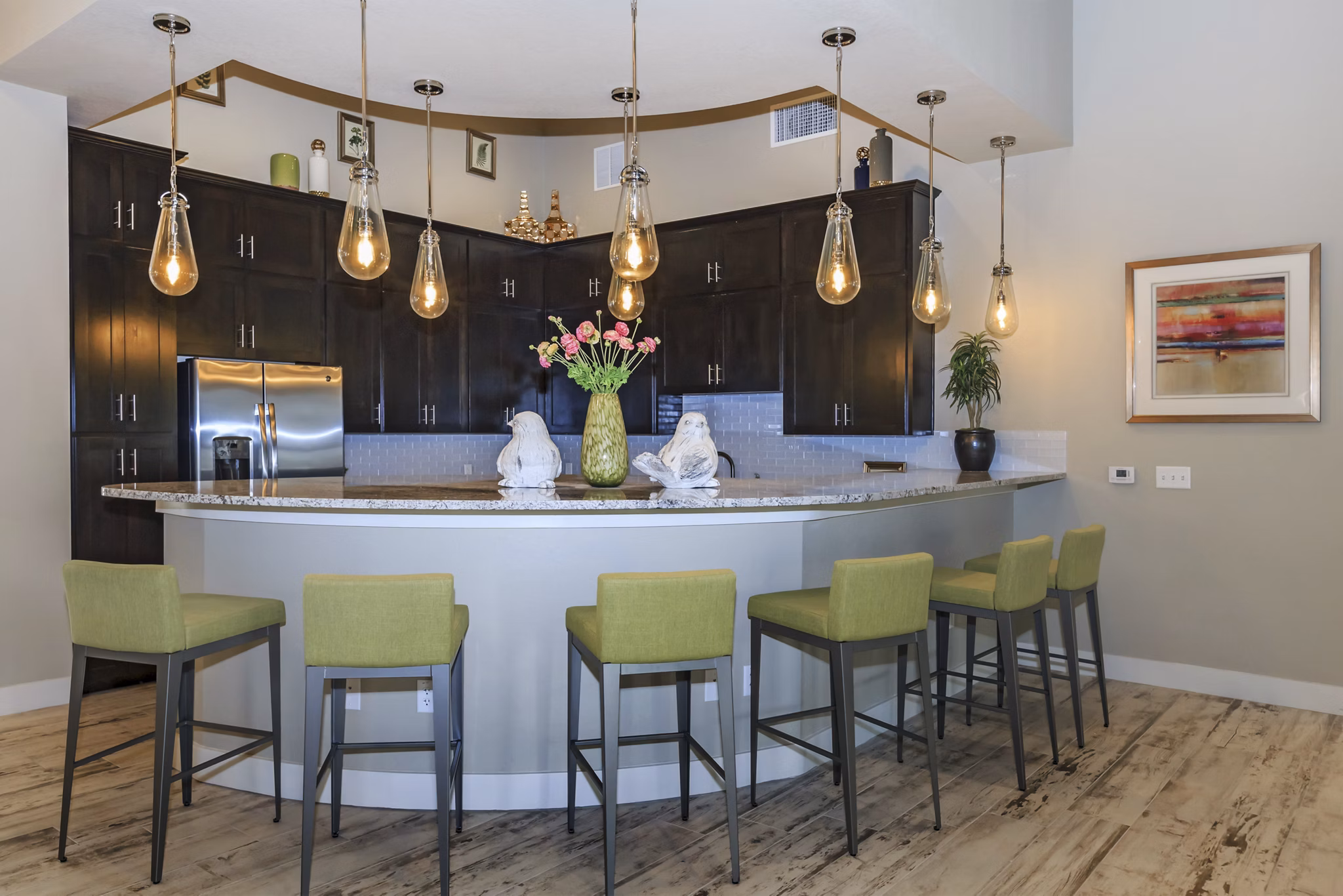 Clubhouse featuring modern design and comfortable seating at Roots at Waco Apartments