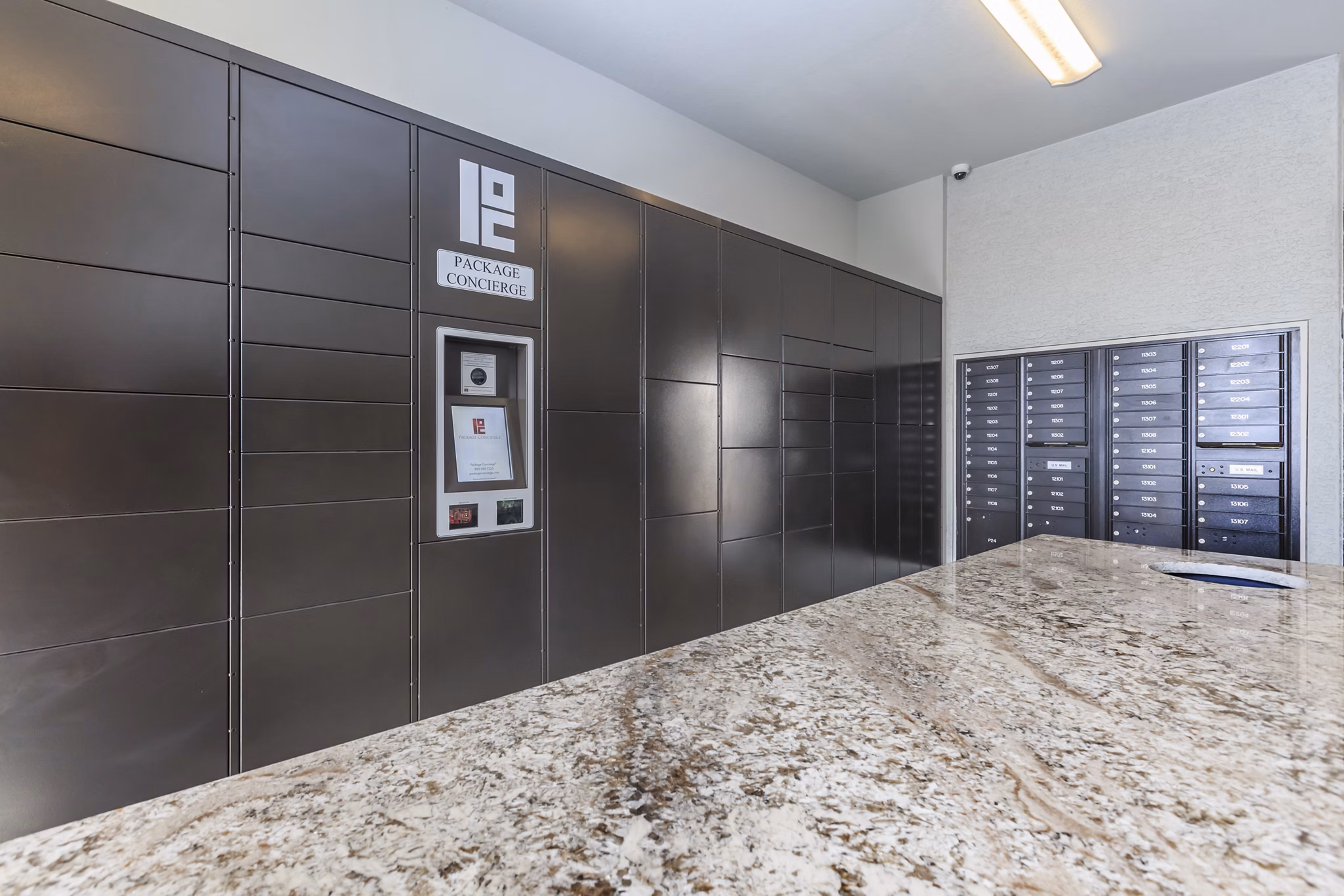 Mailroom with individual lockers at Roots at Waco Apartments