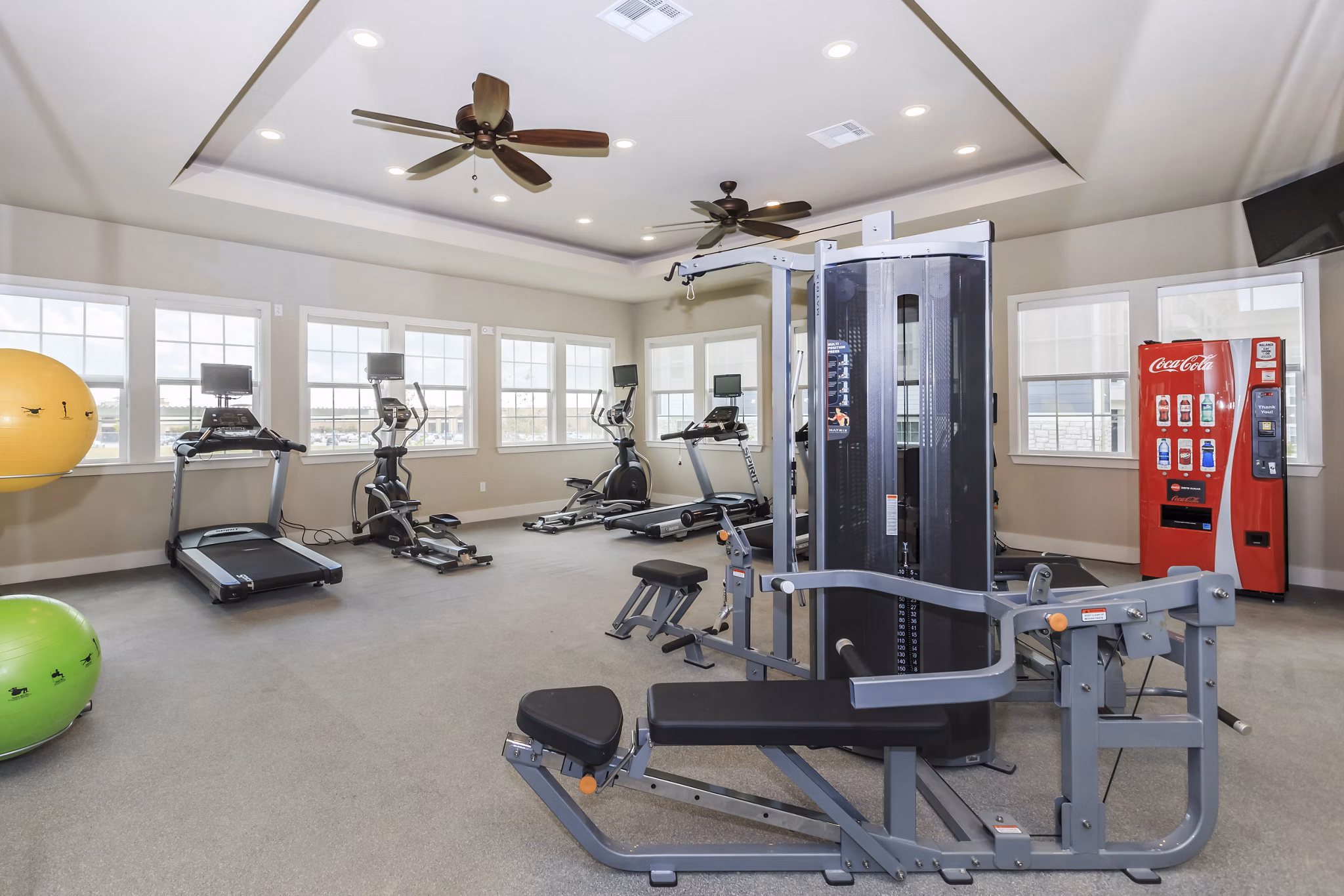 Modern fitness center with state-of-the-art equipment at Roots at Waco Apartments