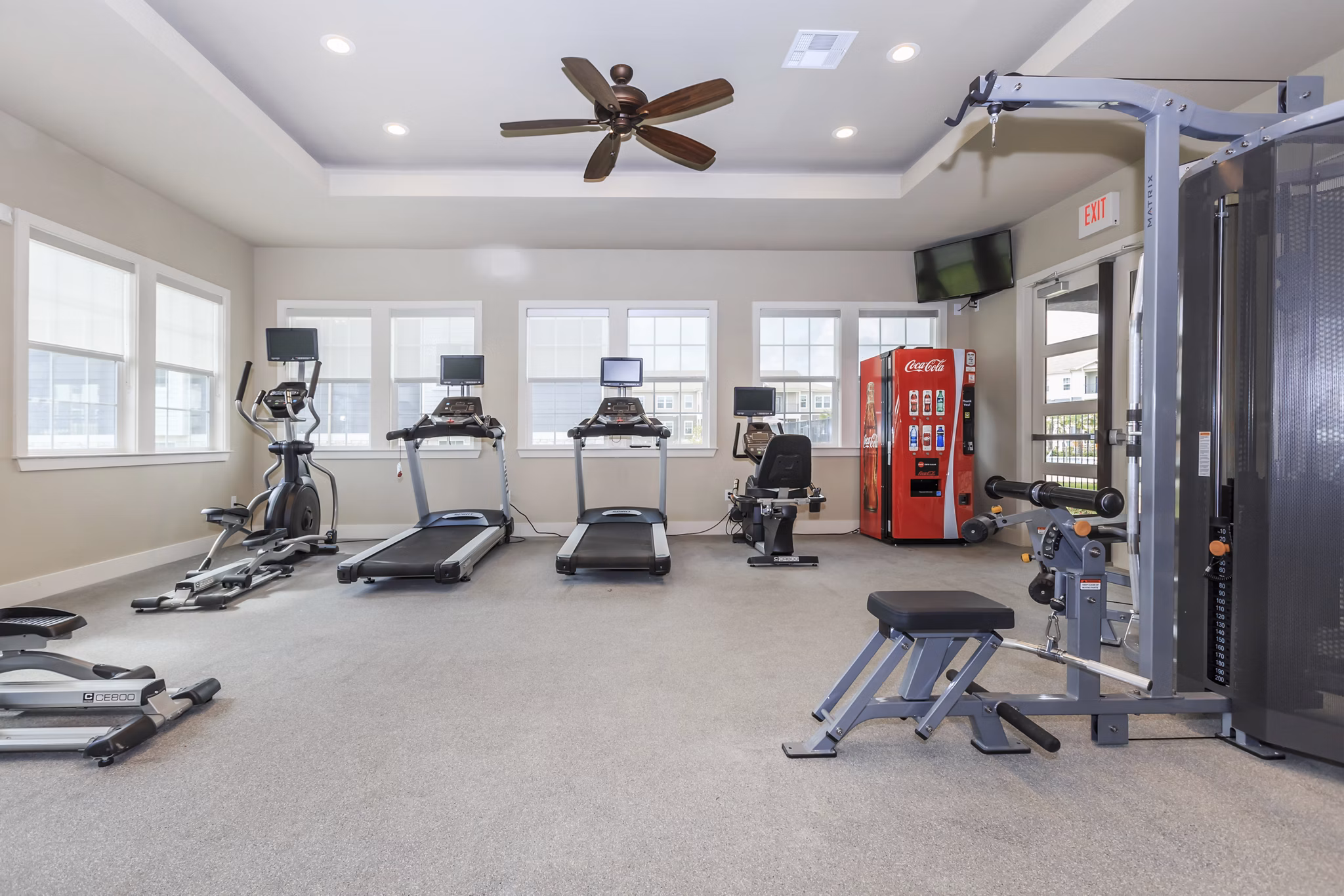 State-of-the-art fitness center at Roots at Waco Apartments offering modern gym equipment and spacious workout areas