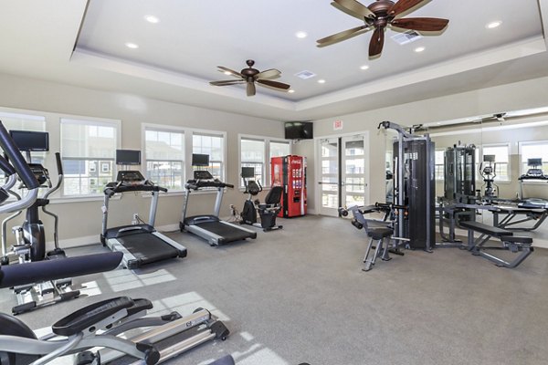 fitness center at Roots at Waco Apartments