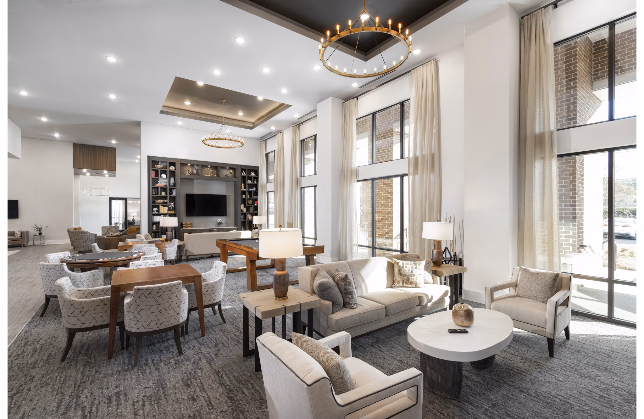Clubhouse featuring modern lounge and community areas at Overture Powers Ferry Apartments