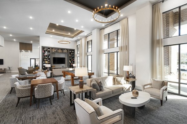 Clubhouse featuring modern lounge and community areas at Overture Powers Ferry Apartments