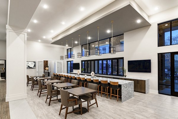 Clubhouse featuring modern design and cozy seating at Overture Powers Ferry Apartments