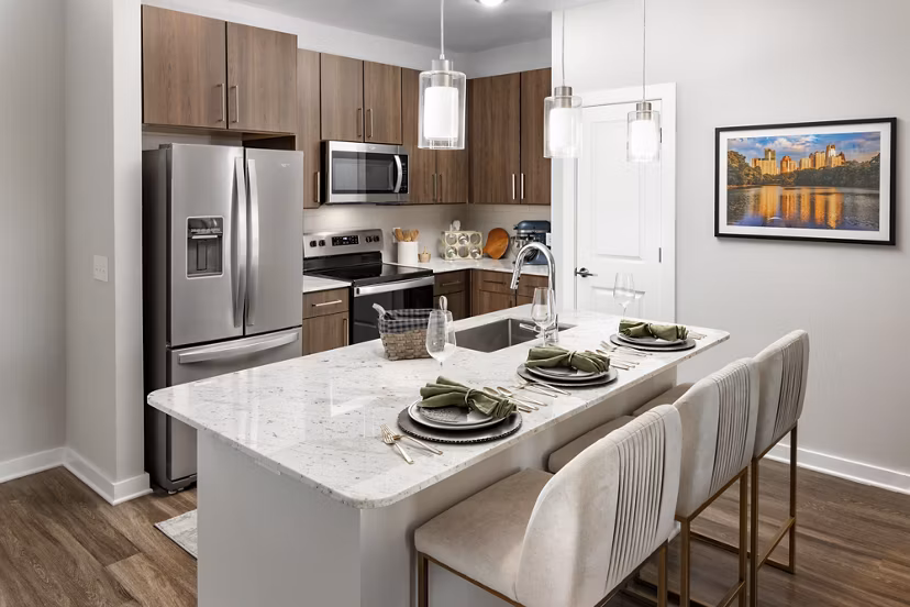 Overture Powers Ferry Apartments: Modern kitchen with stainless steel appliances and granite countertops