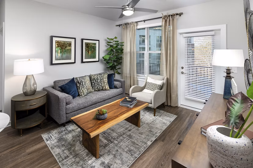 Spacious living room with contemporary furnishings at Overture Powers Ferry Apartments in Atlanta