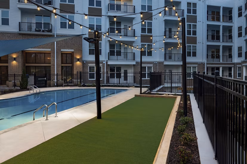 Poolside retreat at Overture Powers Ferry Apartments for relaxation and leisure Ideal for residents seeking a serene and luxurious environment