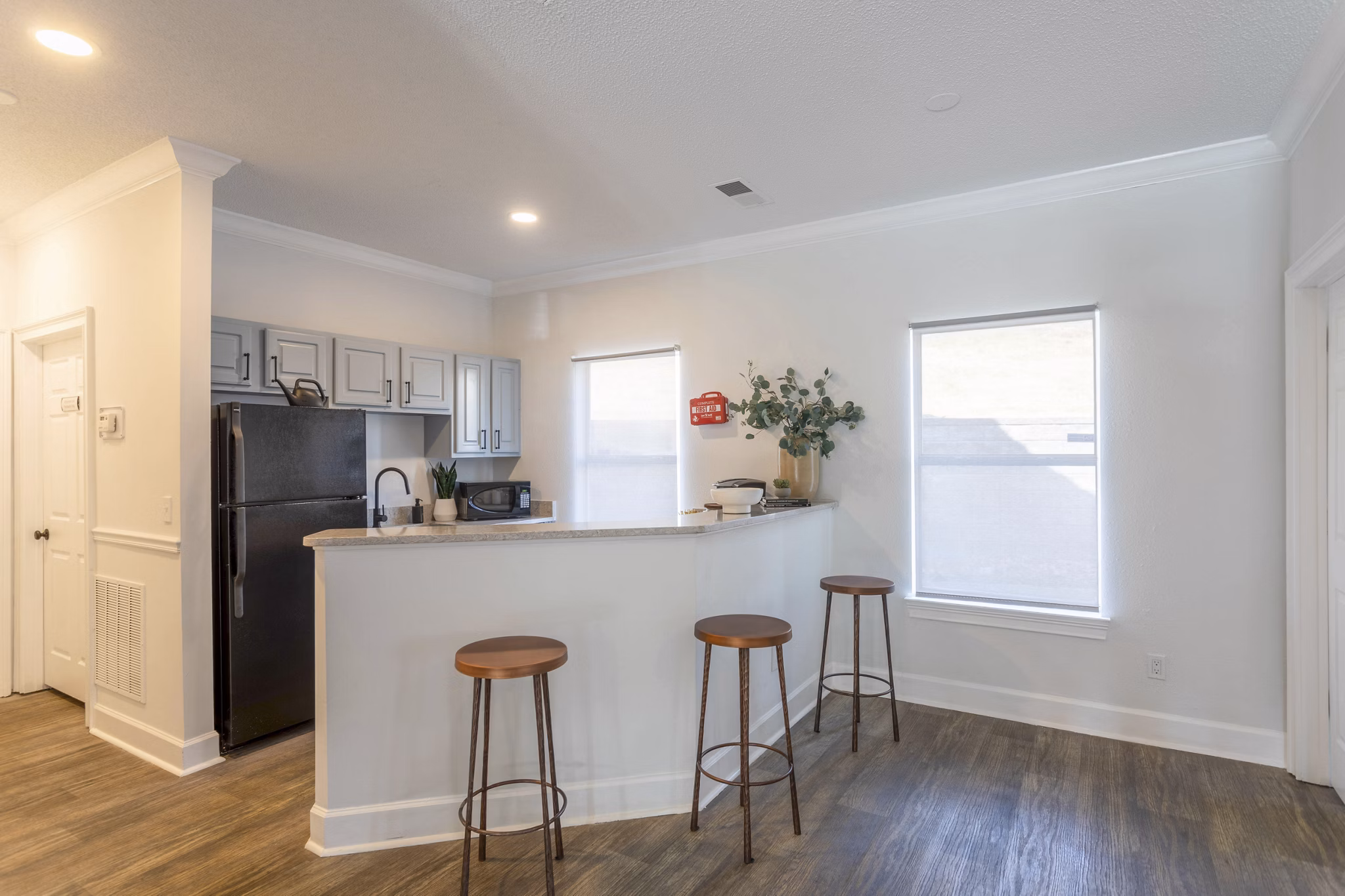 Contemporary kitchen with stainless steel appliances at Avana Bellevue Apartments