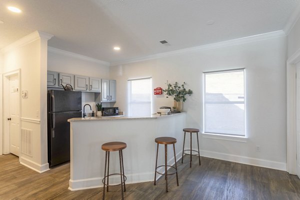 Contemporary kitchen with stainless steel appliances at Avana Bellevue Apartments