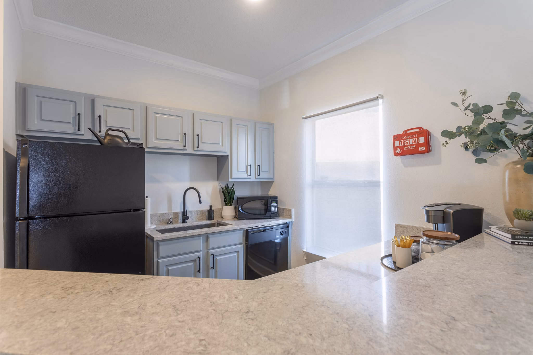 Modern kitchen with stainless steel appliances at Avana Bellevue Apartments
