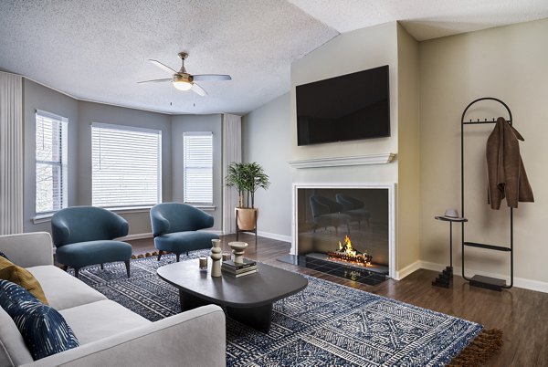 Spacious living room with modern decor in Avana Bellevue Apartments at Greystar community