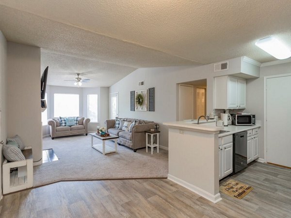 Modern kitchen with stainless steel appliances in Avana Bellevue Apartments