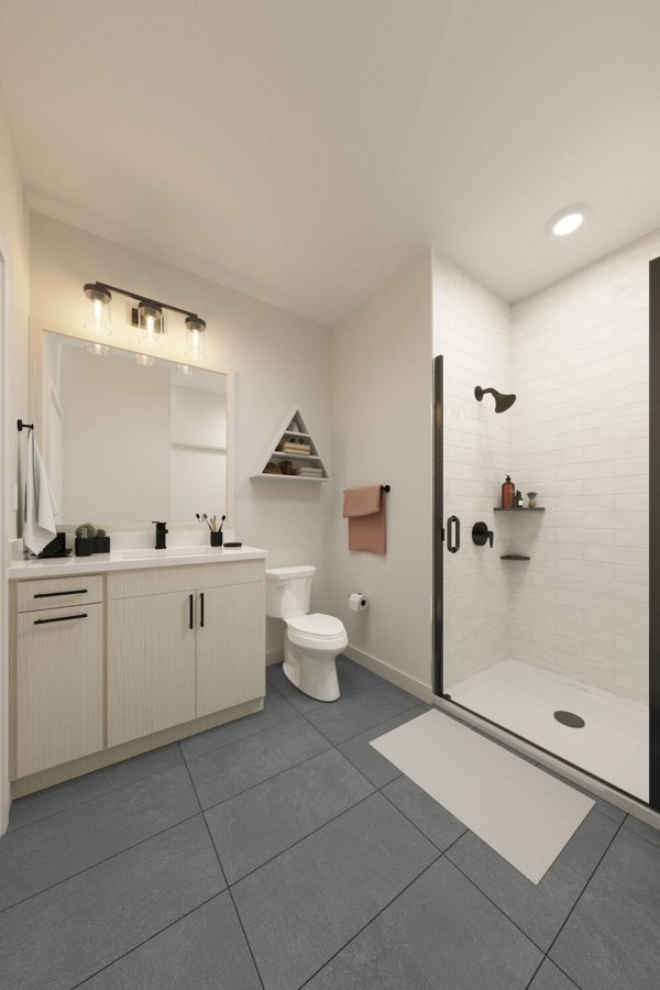 Modern bathroom with stylish fixtures at The Parlor Apartments