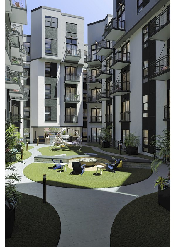 The Parlor Apartments: Lush courtyard with modern seating and greenery, perfect for relaxation and social gatherings in a serene environment