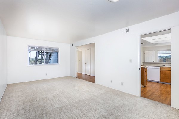Spacious living room with modern decor at Schoonover Park Apartments