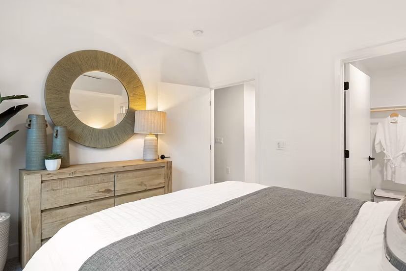 Bedroom with stylish decor and ample natural light at Colony Parc Apartments
