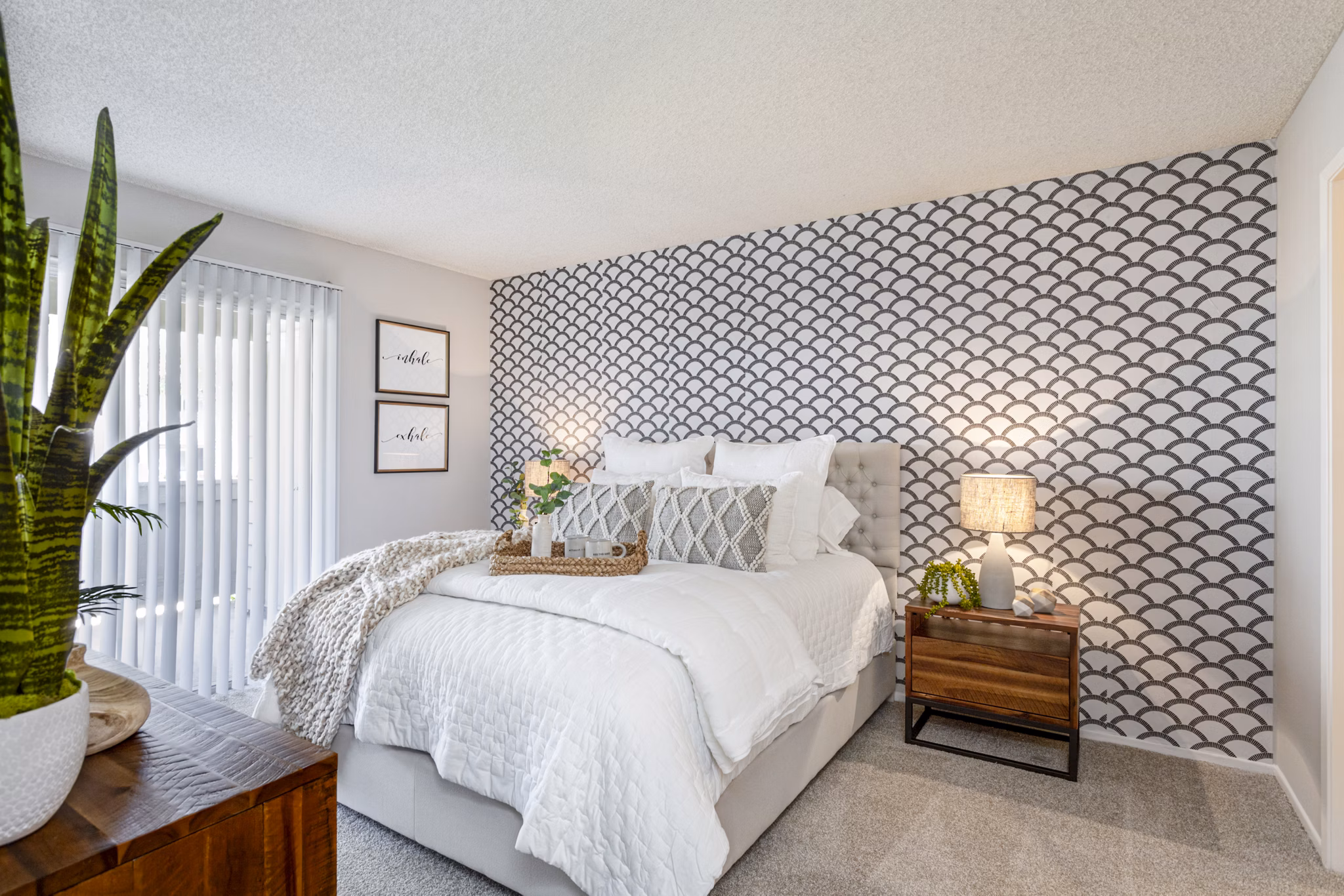 Chic bedroom with elegant decor and natural light at Colony Parc Apartments luxury living