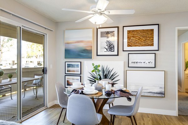 Dining room featuring elegant furnishings and modern lighting in Colony Parc Apartments