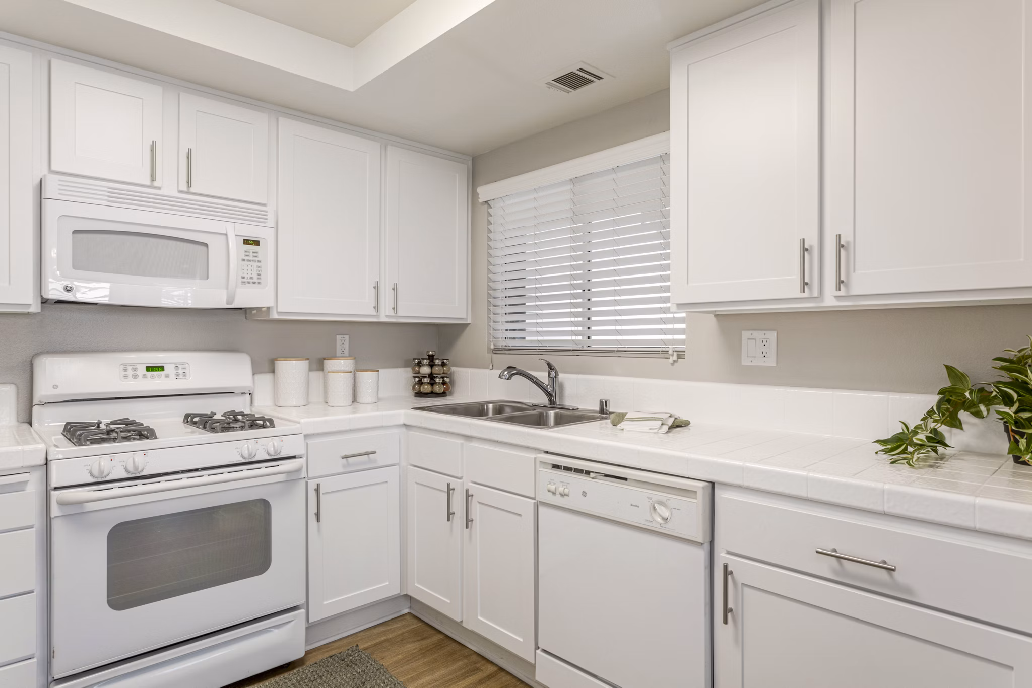 Modern kitchen with stainless steel appliances at Colony Parc Apartments