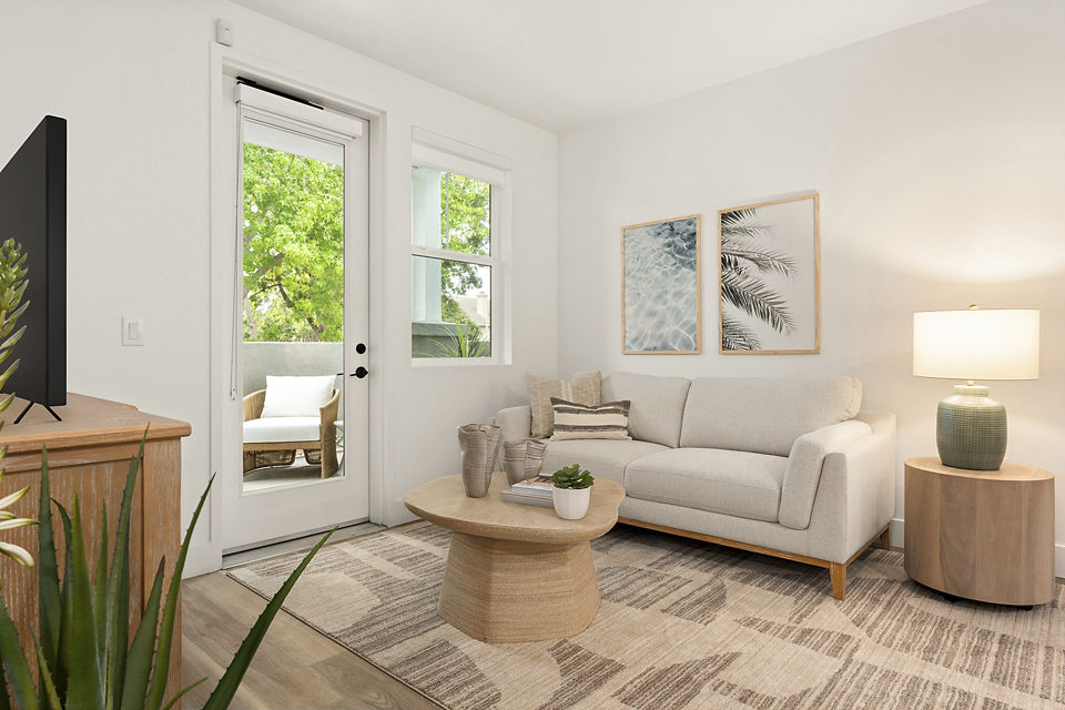 Spacious living room with modern furnishings at Colony Parc Apartments, luxury Greystar property