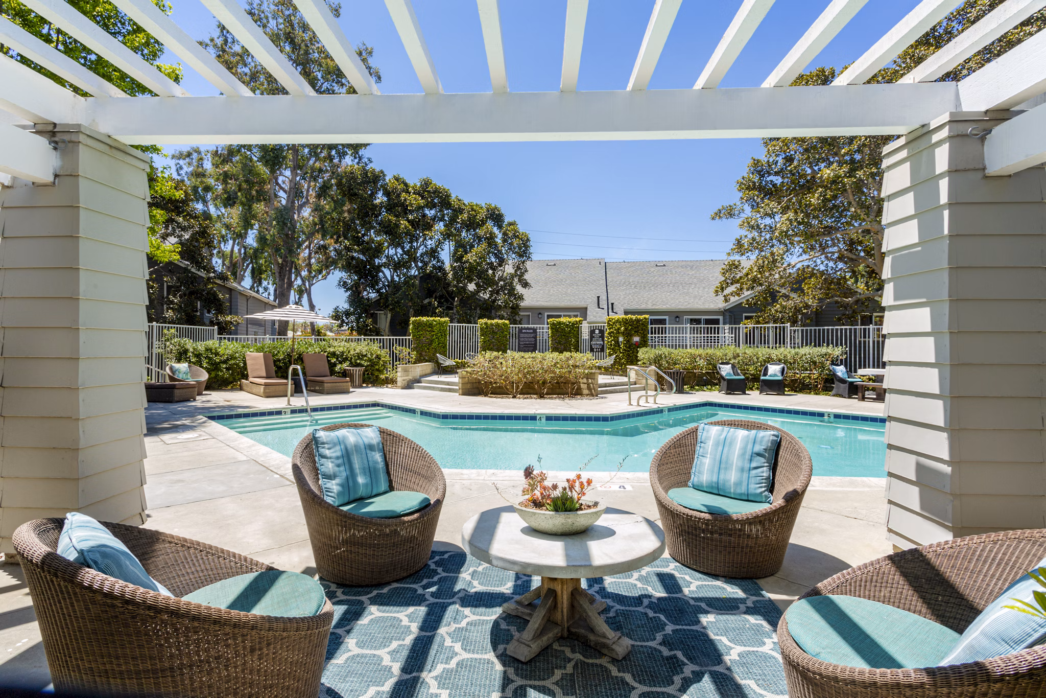 Colony Parc Apartments: Cozy fire pit on a stylish outdoor patio, perfect for relaxing evenings