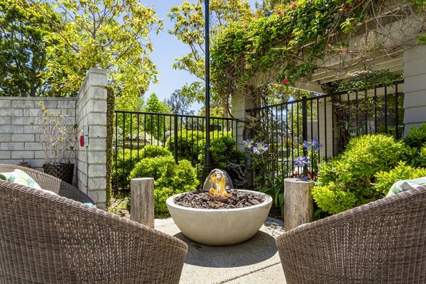 Cozy fire pit on patio at Colony Parc Apartments