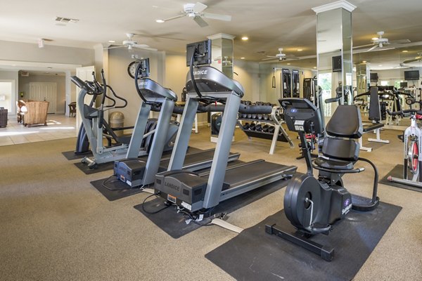 Modern fitness center with state-of-the-art equipment at Somerset Townhomes apartments