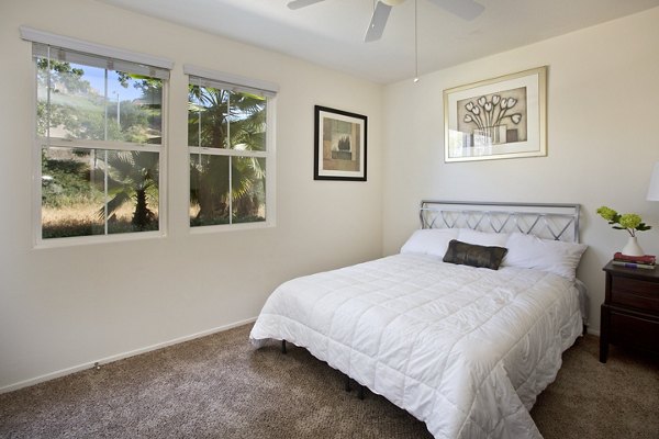 Cozy bedroom with modern decor in Parc Chateaux Apartments