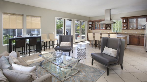 Clubhouse featuring stylish decor and seating at Parc Chateaux Apartments