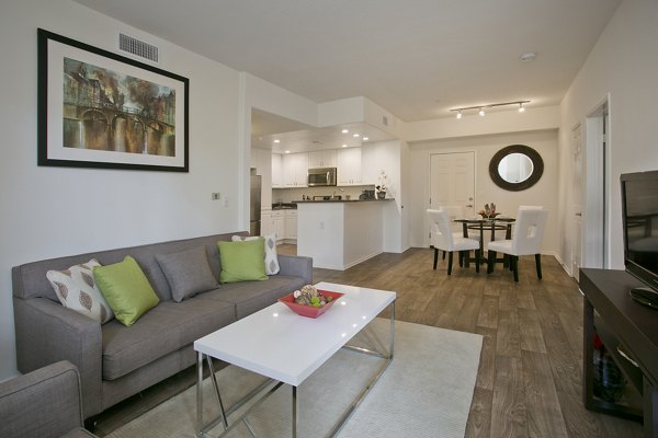 Living room with elegant design and plush furnishings at Parc Chateaux Apartments