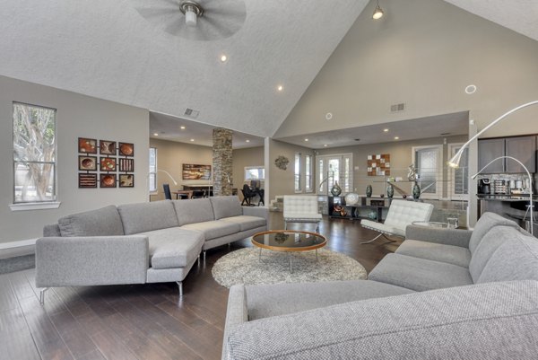 Elegant clubhouse with modern furnishings at Stone Chase Apartments, ideal for luxury living and community events