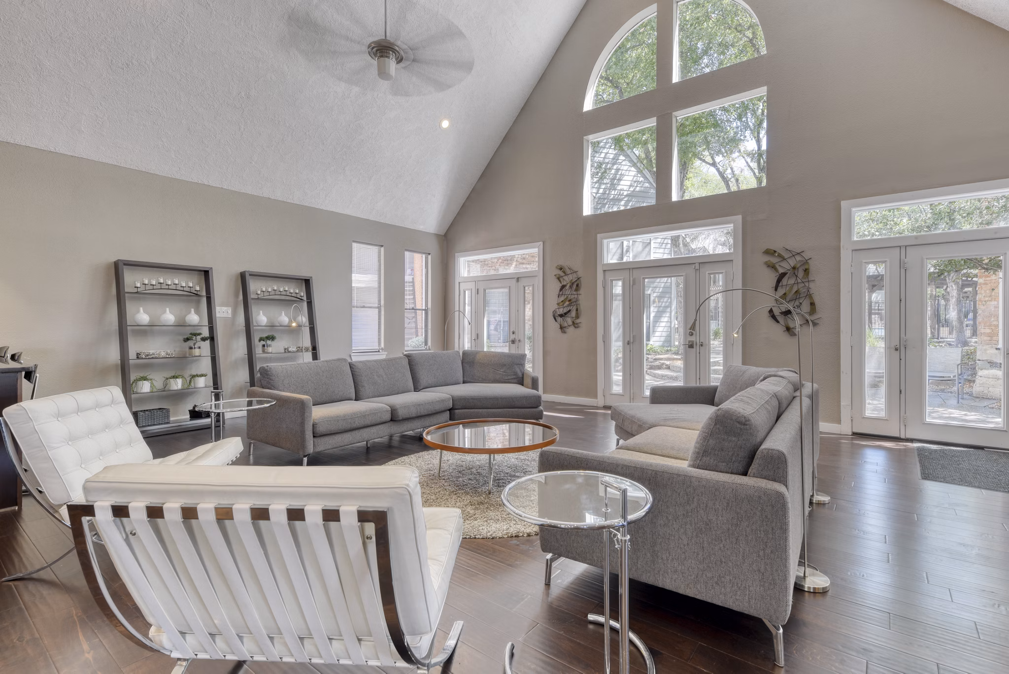 Modern clubhouse with lounge seating and fireplace at Stone Chase Apartments