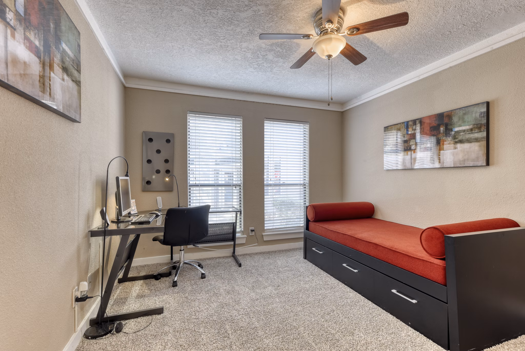 Home office with ergonomic desk and chair in Stone Chase Apartments, ideal for remote work in a luxury Greystar community