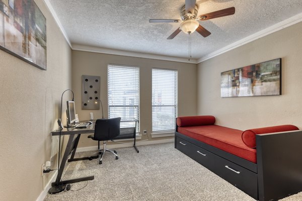 Home office with ergonomic desk and chair in Stone Chase Apartments, ideal for remote work in a luxury Greystar community