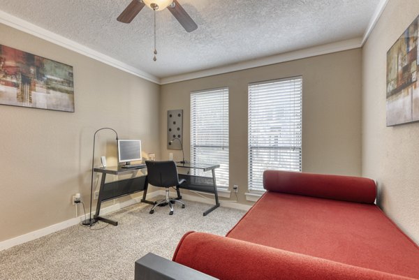 Modern home office with ergonomic furniture in Stone Chase Apartments offering a productive workspace