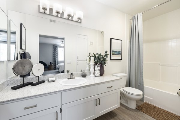 Bathroom with modern fixtures and sleek design at Mission Grove Park Apartments